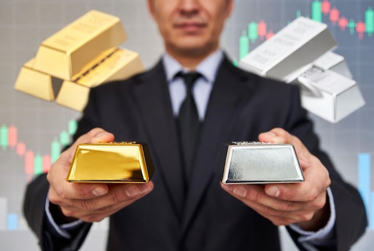 person-suit-holding-gold-silver-bars-against-financial-chart-background_1299514-2035 (1)