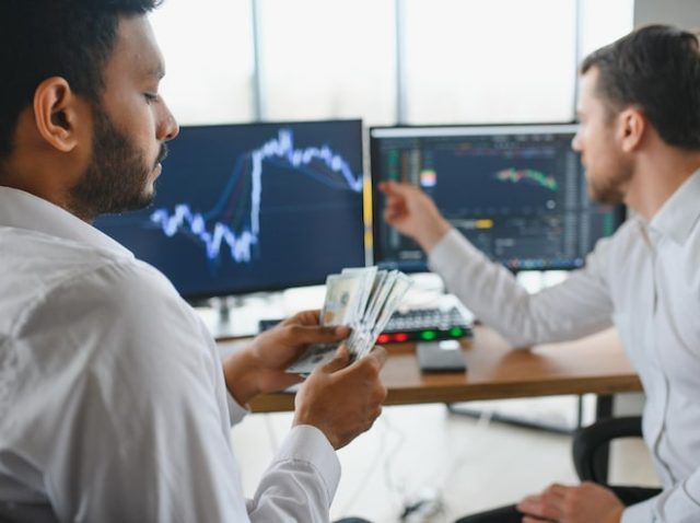 two-diverse-business-men-analysts-partners-talking-working-together-discussing-data-management-using-laptop-computer-indian-manager-consulting-client-with-online-technology-office-meeting_255667-52348